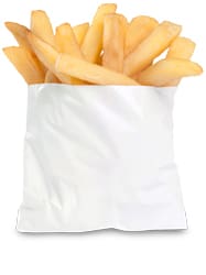 A bag of french fries sitting on top of the floor.