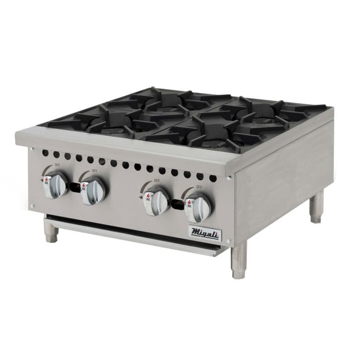 A stove with four burners and one side burner.