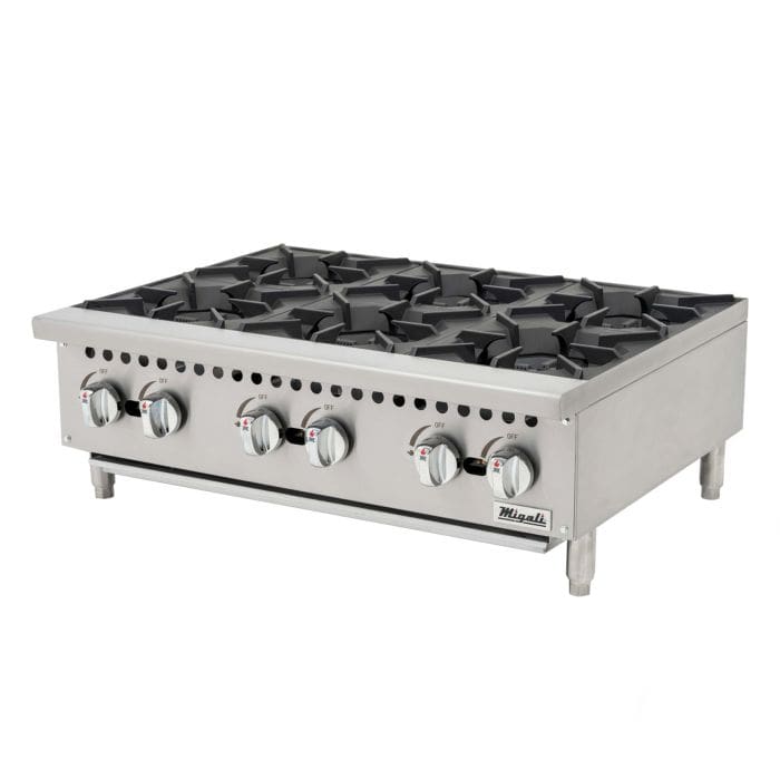 A six burner stove with a flat top.